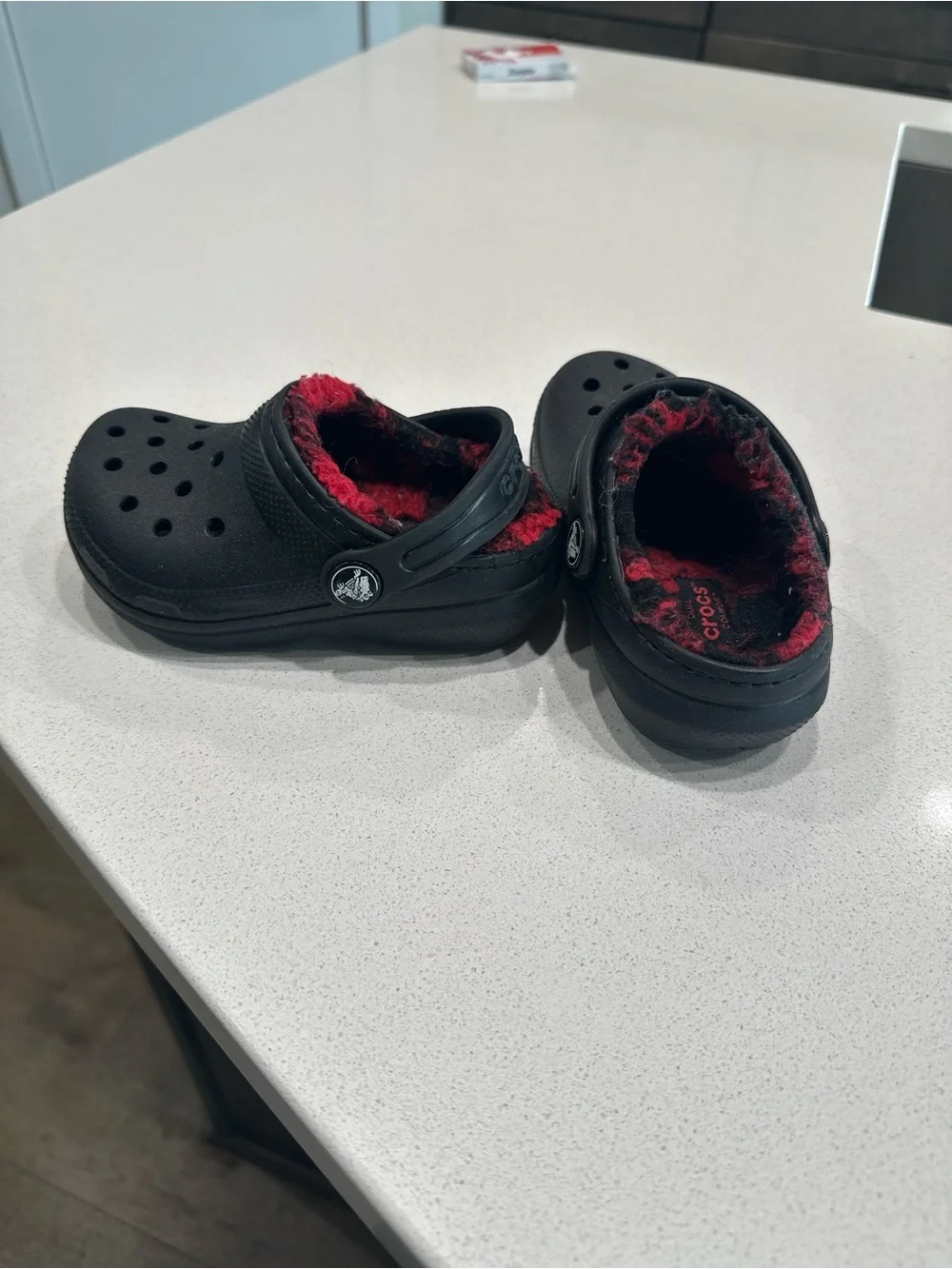 CROCS Kids Black Clog with Red Fleece Lining